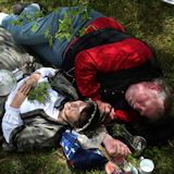 Re-enactors take a nap among the graves at Oak Ridge Cemetery while waiting for the Lincoln funeral procession